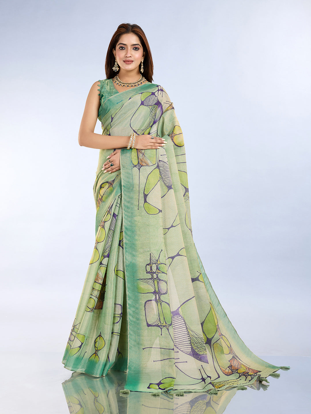 Sea Green Linen Cotton Saree with Tassel Pallu worn by a model, showcasing a blend of elegance and comfort.